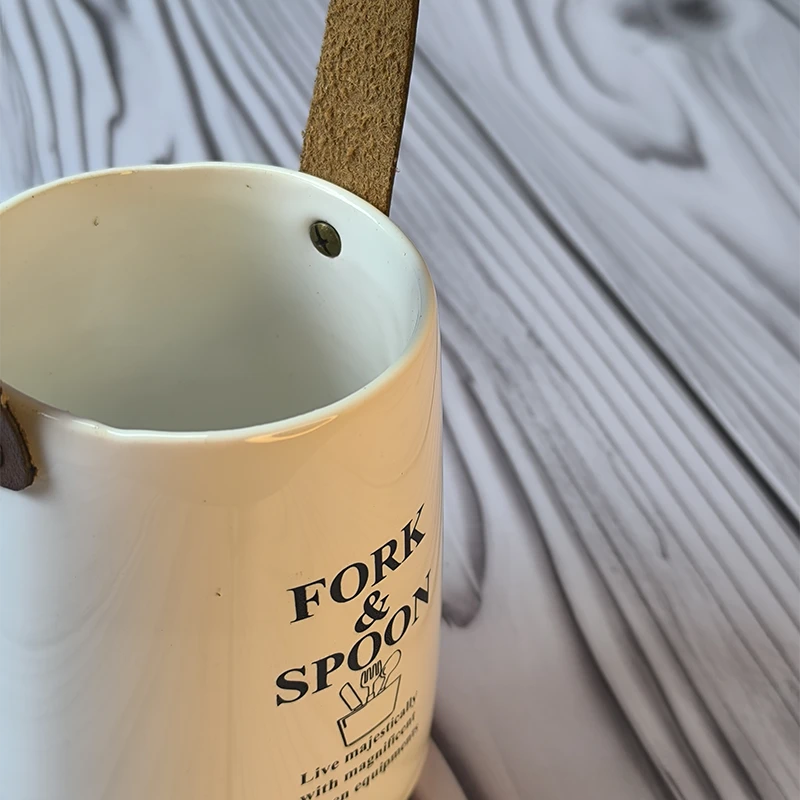 جای قاشق و چنگال سرامیکی با دسته چرم