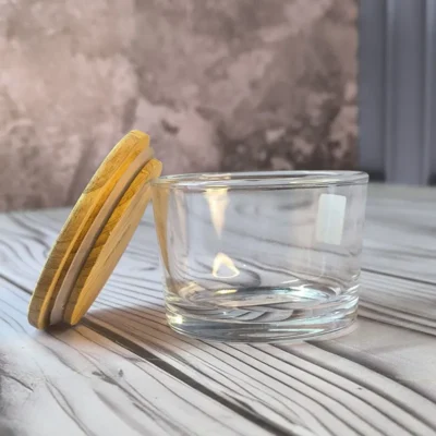 ظرف شیشه ای گرد 190 درب چوبی لیمون