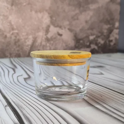 ظرف شیشه ای گرد 190 درب چوبی لیمون